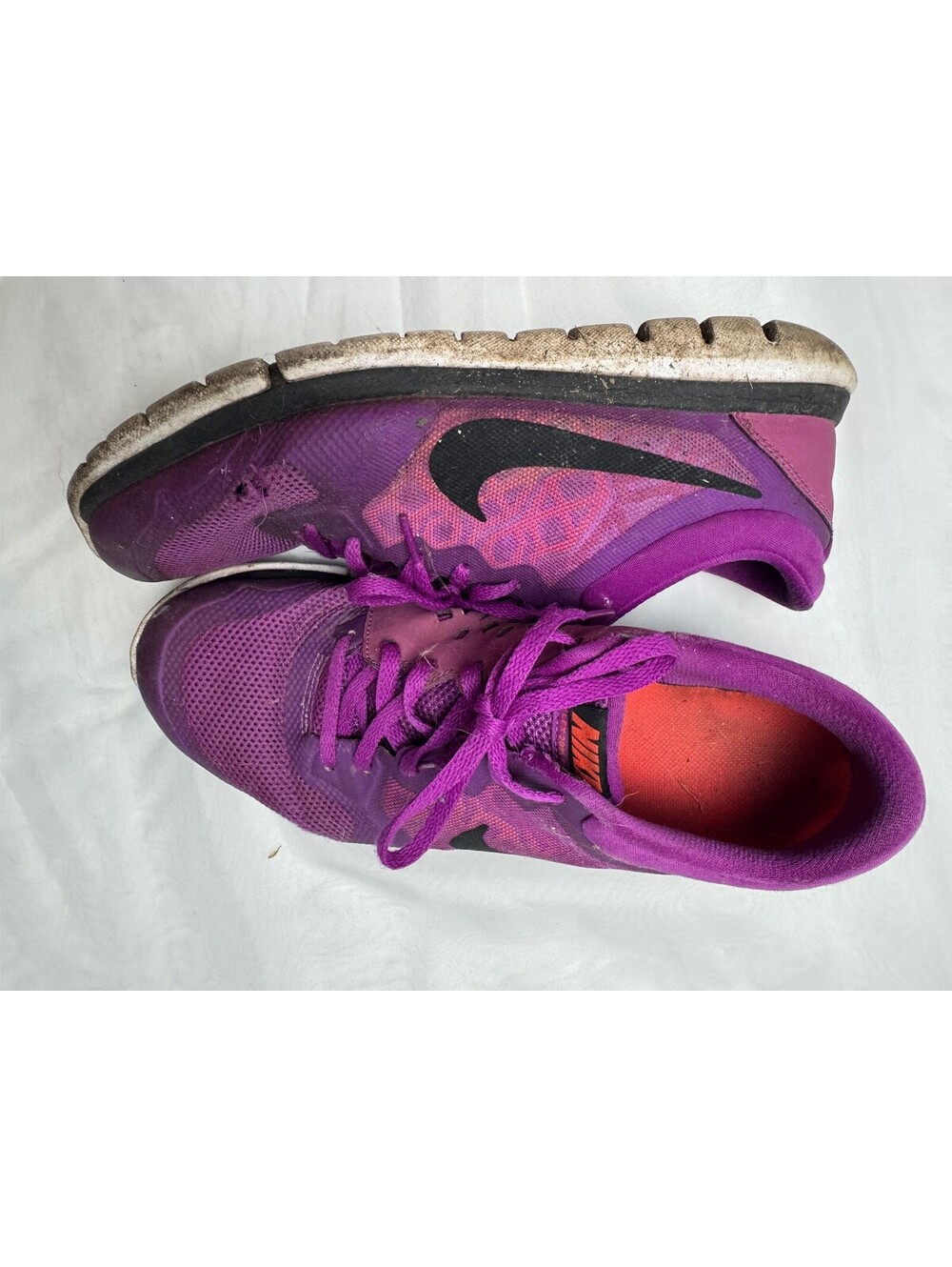 Used Nike Better World purple running shoes
